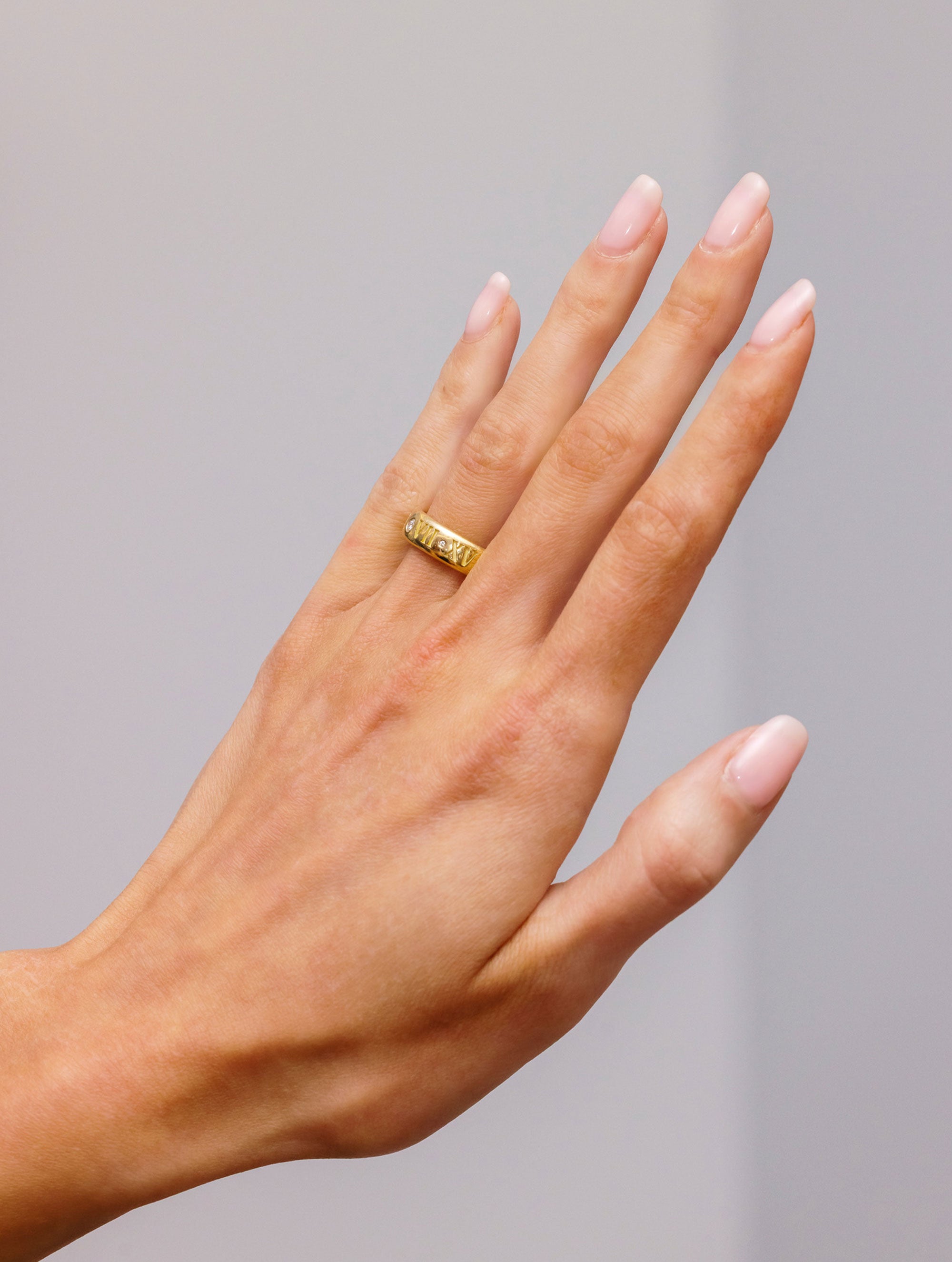 ROMAN NUMERAL STORY RING